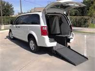 Rear-entry accessible minivan with its ramp extended