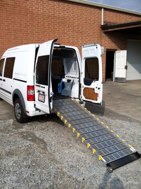 Roll-A-Ramp installed at a van entrance